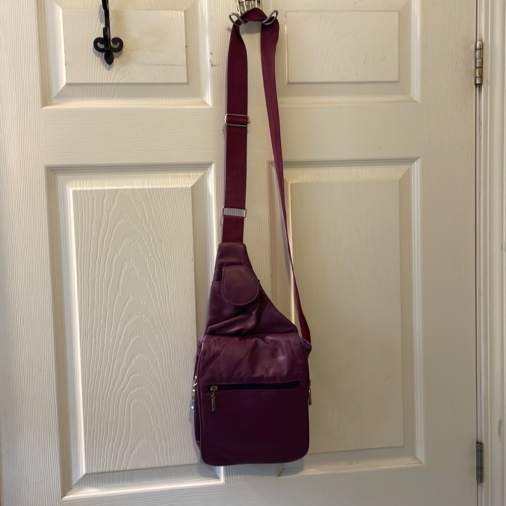 Buxton leather Purple drop leather bag or travel bag